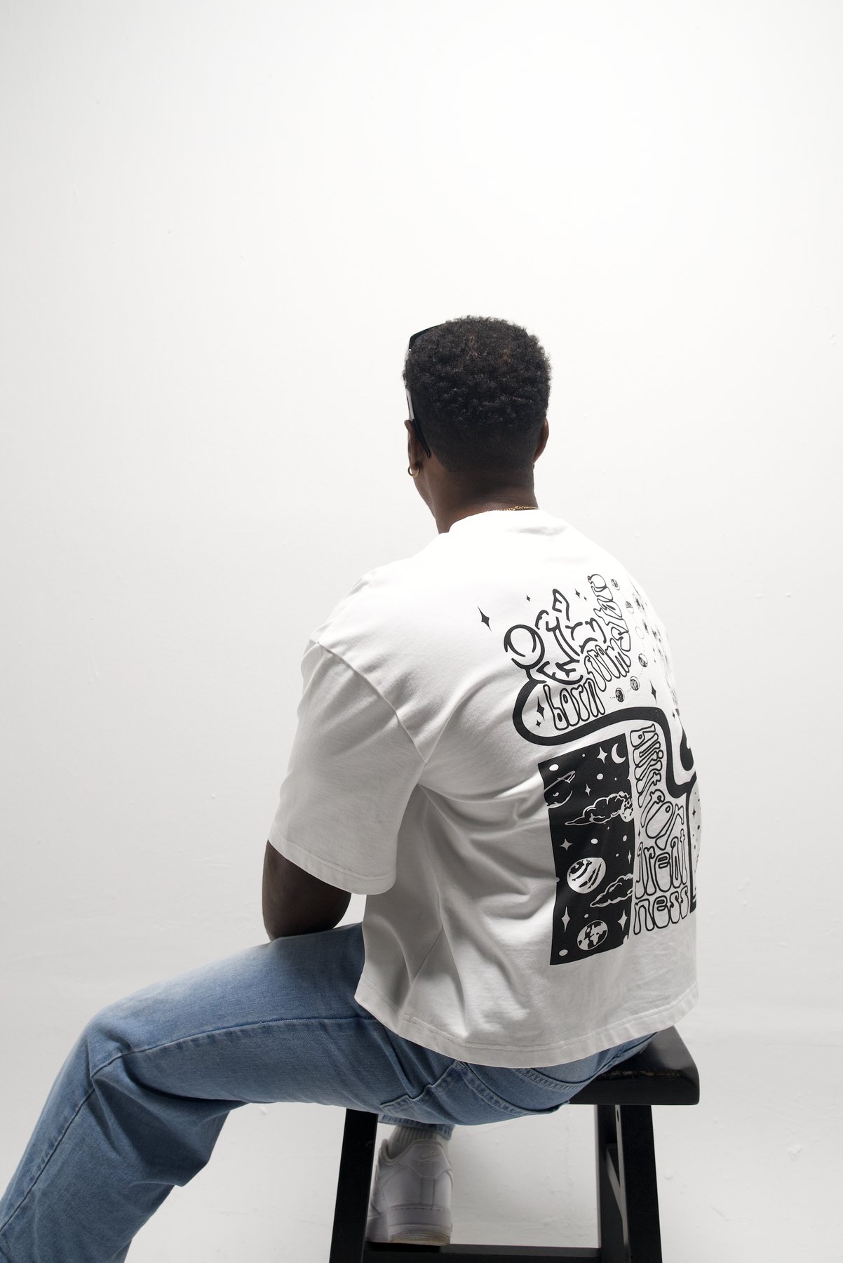 White Tee — back seated